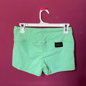 Not Dead Yet athletic leisure; neon green women’s shorts